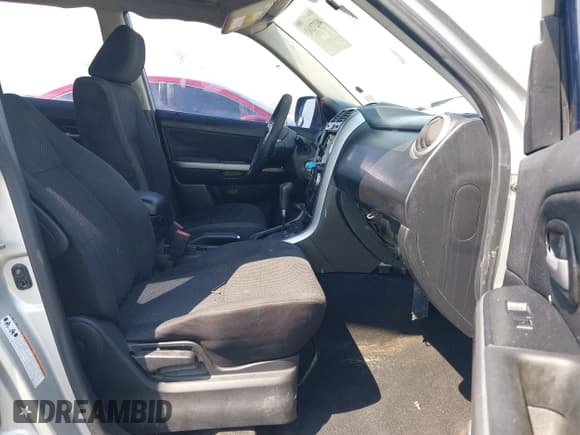 ✅ 2006 Suzuki Grand Vitara • VIN: JS3TE941264103395 • Lot: 40272163. Listed on IAAI with 173,127 mi. Free auction sales archive from the USA and detailed vehicle history report at DreamBid. Image 5.