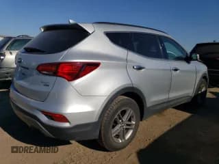 ✅ 2018 Hyundai Santa Fe 2.4L • VIN: 5XYZUDLB9JG505921 • Лот: 76648243. Опубликован ранее на Copart с пробегом 65 623 миль. Бесплатный доступ к архиву аукционных продаж из США и подробный отчёт об истории автомобиля на DreamBid. Изображение 3.