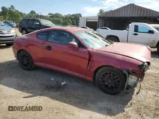 ✅ 2006 Hyundai Tiburon GS • VIN: KMHHM65D46U229462 • Лот: 70912605. Опубликован ранее на Copart с пробегом 169 009 миль. Бесплатный доступ к архиву аукционных продаж из США и подробный отчёт об истории автомобиля на DreamBid. Изображение 4.