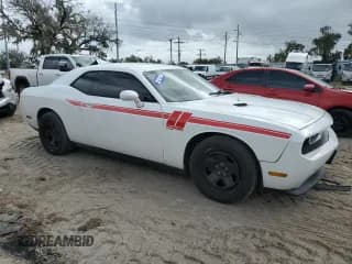 ✅ 2014 Dodge Challenger SXT • VIN: 2C3CDYAG7EH208377 • Lot: 78847714. Wystawiony na Copart z przebiegiem 165 699 mil. Bezpłatny archiwum sprzedaży aukcyjnych z USA i szczegółowy raport historii pojazdu na DreamBid. Zdjęcie 4.