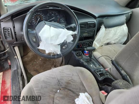 ✅ 2001 Saturn SC • VIN: 1G8ZY12771Z327700 • Лот: 69036975. Опубликован ранее на Copart с пробегом Не указан. Бесплатный доступ к архиву аукционных продаж из США и подробный отчёт об истории автомобиля на DreamBid. Изображение 8.