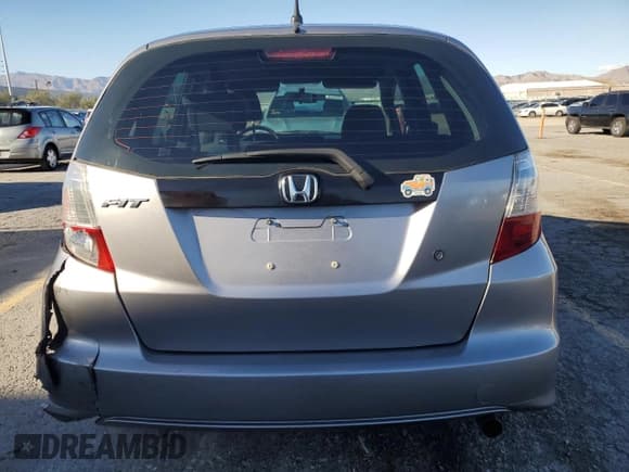 ✅ 2009 Honda Fit • VIN: JHMGE88289S072150 • Lot: 84622435. Listed on Copart with 115,962 mi. Free auction sales archive from the USA and detailed vehicle history report at DreamBid. Image 6.