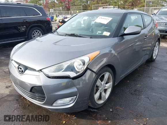 ✅ 2014 Hyundai Veloster • VIN: KMHTC6AD9EU192555 • Lot: 43606825. Wystawiony na IAAI z przebiegiem 69 171 mil. Bezpłatny archiwum sprzedaży aukcyjnych z USA i szczegółowy raport historii pojazdu na DreamBid. Zdjęcie 2.