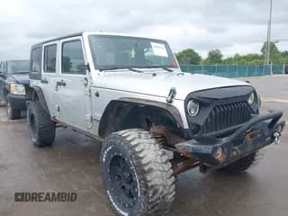 ✅ 2008 Jeep Wrangler Unlimited Sahara • VIN: 1J4GA59148L617989 • Лот: 43095265. Опубликован ранее на IAAI с пробегом 153 328 миль. Бесплатный доступ к архиву аукционных продаж из США и подробный отчёт об истории автомобиля на DreamBid. Изображение 1.