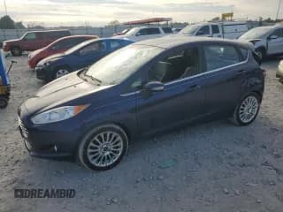 ✅ 2016 Ford Fiesta Titanium • VIN: 3FADP4FJ3GM158303 • Lot: 86307955. Wystawiony na Copart z przebiegiem 117 923 mil. Bezpłatny archiwum sprzedaży aukcyjnych z USA i szczegółowy raport historii pojazdu na DreamBid. Zdjęcie 1.