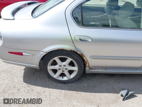 ✅ 2003 Nissan Maxima SE • VIN: JN1DA31D33T513282 • Lot: 42289710. Wystawiony na IAAI z przebiegiem 343 973 mil. Bezpłatny archiwum sprzedaży aukcyjnych z USA i szczegółowy raport historii pojazdu na DreamBid. Zdjęcie 13.