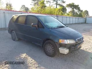 ✅ 1997 Honda Odyssey LX • VIN: JHMRA1863VC006656 • Lot: 43257539. Wystawiony na IAAI z przebiegiem 143 871 mil. Bezpłatny archiwum sprzedaży aukcyjnych z USA i szczegółowy raport historii pojazdu na DreamBid. Zdjęcie 1.