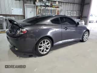 ✅ 2008 Hyundai Tiburon GT • VIN: KMHHN66F18U280756 • Лот: 81469935. Опубликован ранее на Copart с пробегом 227 955 миль. Бесплатный доступ к архиву аукционных продаж из США и подробный отчёт об истории автомобиля на DreamBid. Изображение 3.