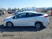 ✅ 2022 Toyota Prius LE • VIN: JTDKAMFP8N3198379 • Lot: 42094943. Listed on IAAI with 14,428 mi. Free auction sales archive from the USA and detailed vehicle history report at DreamBid. Image 14.