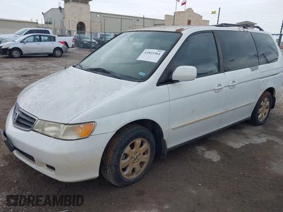 ✅ 2004 Honda Odyssey EX-L • VIN: 5FNRL18014B121667 • Lot: 43823364. Listed on IAAI with 181,640 mi. Free auction sales archive from the USA and detailed vehicle history report at DreamBid. Image 2.
