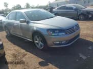 ✅ 2013 Volkswagen Passat SEL Premium • VIN: 1VWCN7A39DC139948 • Lot: 42990859. Listed on IAAI with 145,169 mi. Free auction sales archive from the USA and detailed vehicle history report at DreamBid. Image 1.