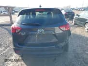 ✅ 2016 Mazda CX-5 Sport • VIN: JM3KE4BY9G0784667 • Lot: 43737851. Listed on IAAI with 151,569 mi. Free auction sales archive from the USA and detailed vehicle history report at DreamBid. Image 16.