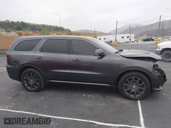 2018 Dodge Durango R/T with VIN 1C4SDHCT8JC100591, listed as a IAAI auction lot 43296025 with 95,326 mi miles and . Bid and sale history available at DreamBid. Image 14.