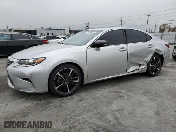 ✅ 2016 Lexus ES 300h • VIN: JTHBW1GG9G2116794 • Lot: 50635095. Listed on Copart with 248,087 mi. Free auction sales archive from the USA and detailed vehicle history report at DreamBid. Image 1.