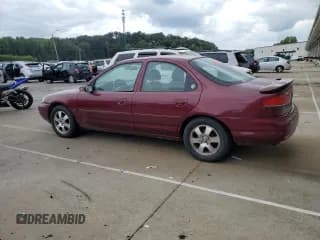 ✅ 1999 Mercury Mystique • VIN: 1MEFM66L4XK617806 • Лот: 69687625. Опубликован ранее на Copart с пробегом 84 409 миль. Бесплатный доступ к архиву аукционных продаж из США и подробный отчёт об истории автомобиля на DreamBid. Изображение 2.