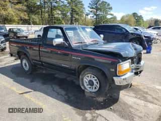 1992 Dodge Dakota with VIN 1B7GL26Y9NS516870, listed as a Copart auction lot 49988595 with 62,974 mi miles and Salvage title. Bid and sale history available at DreamBid. Image 4.