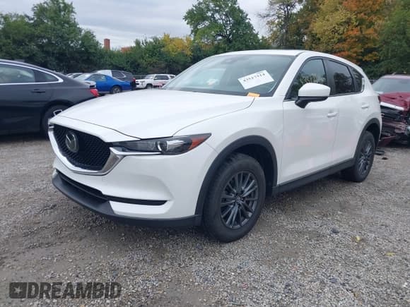 ✅ 2019 Mazda CX-5 Touring • VIN: JM3KFBCM3K1617334 • Lot: 43517314. Wystawiony na IAAI z przebiegiem 65 731 mil. Bezpłatny archiwum sprzedaży aukcyjnych z USA i szczegółowy raport historii pojazdu na DreamBid. Zdjęcie 2.