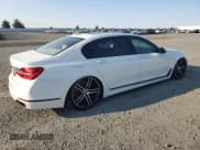 ✅ 2016 BMW 7 Series 740i • VIN: WBA7E2C52GG547305 • Лот: 80148255. Опубликован ранее на Copart с пробегом 99 952 миль. Бесплатный доступ к архиву аукционных продаж из США и подробный отчёт об истории автомобиля на DreamBid. Изображение 3.