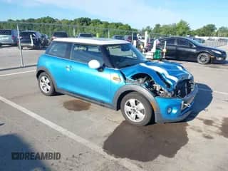 2015 MINI Hardtop with VIN WMWXM5C57FT940825, listed as a IAAI auction lot 43042210 with 197,907 mi miles and . Bid and sale history available at DreamBid. Image 1.