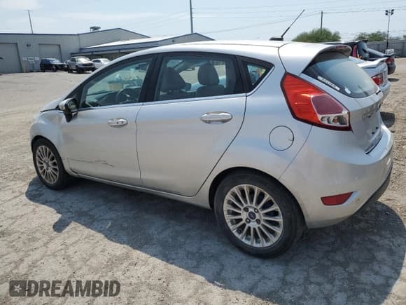 ✅ 2015 Ford Fiesta Titanium • VIN: 3FADP4FJ6FM208772 • Лот: 64333885. Опубликован ранее на Copart с пробегом 167 317 миль. Бесплатный доступ к архиву аукционных продаж из США и подробный отчёт об истории автомобиля на DreamBid. Изображение 2.