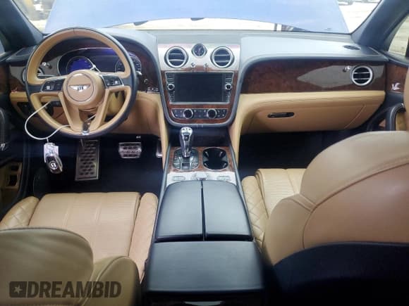 ✅ 2017 Bentley Bentayga W12 • VIN: SJAAC2ZV2HC014080 • Lot: 44806115. Listed on Copart with 63,077 mi. Free auction sales archive from the USA and detailed vehicle history report at DreamBid. Image 8.