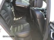 ✅ 2016 Porsche Macan Turbo • VIN: WP1AF2A55GLB94427 • Lot: 52708835. Listed on Copart with 137,683 mi. Free auction sales archive from the USA and detailed vehicle history report at DreamBid. Image 11.