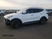 ✅ 2017 Hyundai Santa Fe Ultimate • VIN: 5XYZWDLA0HG496733 • Лот: 77305753. Опубликован ранее на Copart с пробегом 66 774 миль. Бесплатный доступ к архиву аукционных продаж из США и подробный отчёт об истории автомобиля на DreamBid. Изображение 1.