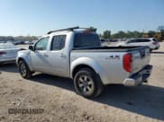 ✅ 2012 Nissan Frontier Pro-4X • VIN: 1N6AD0EV3CC405900 • Lot: 63515115. Listed on Copart with 61,015 mi. Free auction sales archive from the USA and detailed vehicle history report at DreamBid. Image 2.