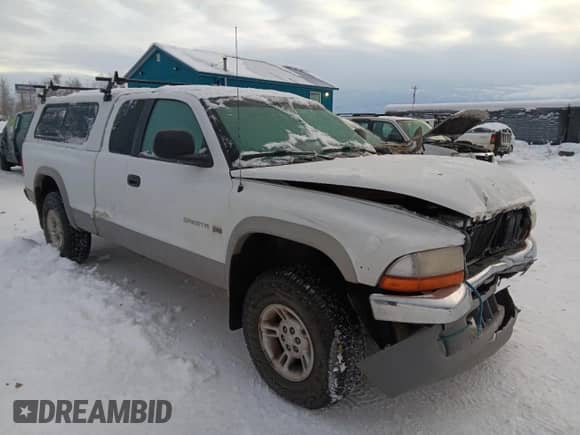 1998 Dodge Dakota SLT z VIN 1B7GG22X0WS597602, wystawiony jako Copart lot #84299884 z przebiegiem 187 120 mil mil oraz Szkoda całkowita • Salvage title. Historia ofert i sprzedaży dostępna na DreamBid. Obrazek 4.