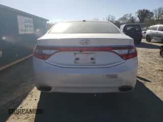 2013 Hyundai Azera с VIN KMHFH4JG2DA212254, выставлен на аукционе Copart как лот 84043814 с пробегом 39 452 миль миль и Списание • Salvage title. История ставок и продаж доступна на DreamBid. Изображение 6.
