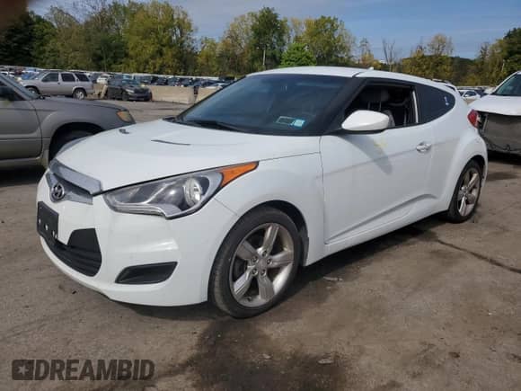 2013 Hyundai Veloster w/Gray Int с VIN KMHTC6AD0DU167414, выставлен на аукционе Copart как лот 73476894 с пробегом 119 928 миль миль и Списание • Salvage title. История ставок и продаж доступна на DreamBid. Изображение 1.