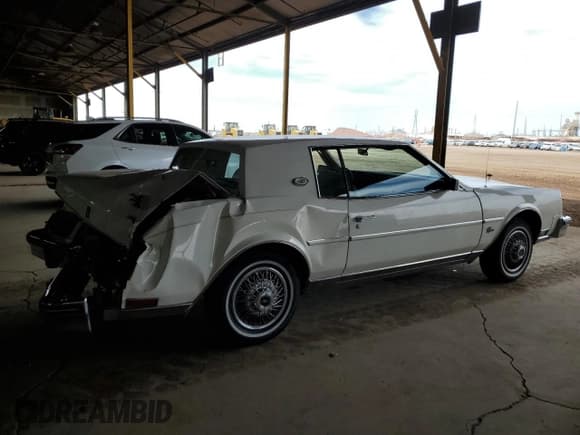 ✅ 1985 Buick Riviera • VIN: 1G4EZ57Y6FE407347 • Лот: 58836105. Опубликован ранее на Copart с пробегом 25 206 миль. Бесплатный доступ к архиву аукционных продаж из США и подробный отчёт об истории автомобиля на DreamBid. Изображение 3.