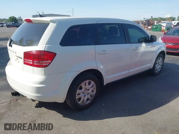 ✅ 2013 Dodge Journey Canada Value • VIN: 3C4PDCAB5DT671600 • Lot: 42608109. Listed on IAAI with 142,559 mi. Free auction sales archive from the USA and detailed vehicle history report at DreamBid. Image 4.