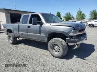 2002 Chevrolet Silverado 2500HD LS z VIN 1GCHK29U12E136559, wystawiony jako Copart lot #59023365 z przebiegiem 274 974 mil mil oraz Szkoda całkowita • Salvage title. Historia ofert i sprzedaży dostępna na DreamBid. Obrazek 4.