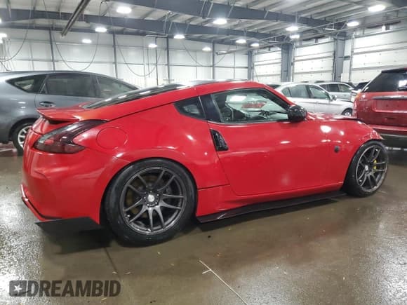 ✅ 2012 Nissan 370Z • VIN: JN1AZ4EH1CM560027 • Лот: 85123154. Опубликован ранее на Copart с пробегом 107 312 миль. Бесплатный доступ к архиву аукционных продаж из США и подробный отчёт об истории автомобиля на DreamBid. Изображение 3.