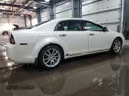 ✅ 2011 Chevrolet Malibu LTZ • VIN: 1G1ZE5E13BF202542 • Lot: 79609524. Listed on Copart with 92,301 mi. Free auction sales archive from the USA and detailed vehicle history report at DreamBid. Image 3.