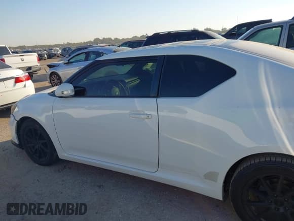 ✅ 2014 Scion tC Monogram • VIN: JTKJF5C72E3074107 • Lot: 43448713. Listed on IAAI with 84,697 mi. Free auction sales archive from the USA and detailed vehicle history report at DreamBid. Image 14.