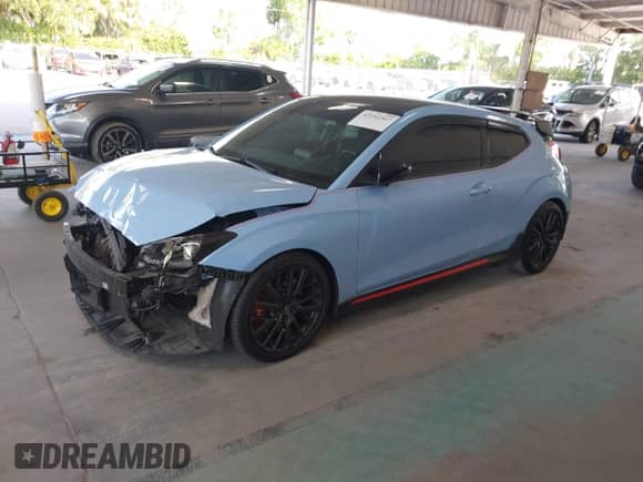 2020 Hyundai Veloster z VIN KMHT36AH1LU004224, wystawiony jako IAAI lot #42292567 z przebiegiem 74 725 mil mil oraz . Historia ofert i sprzedaży dostępna na DreamBid. Obrazek 2.