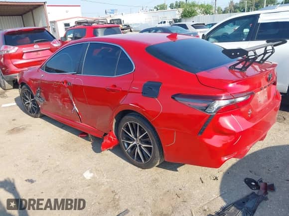 2022 Toyota Camry SE z VIN 4T1G11AK7NU036054, wystawiony jako IAAI lot #43036833 z przebiegiem 106 915 mil mil oraz . Historia ofert i sprzedaży dostępna na DreamBid. Obrazek 3.