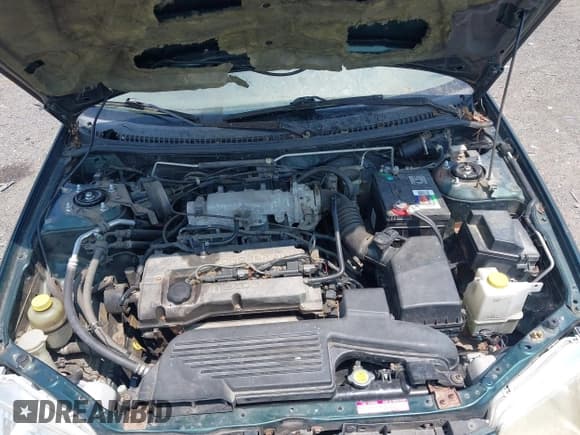 ✅ 2000 Mazda Protege DX • VIN: JM1BJ2227Y0260567 • Lot: 42786074. Wystawiony na IAAI z przebiegiem 177 256 mil. Bezpłatny archiwum sprzedaży aukcyjnych z USA i szczegółowy raport historii pojazdu na DreamBid. Zdjęcie 10.