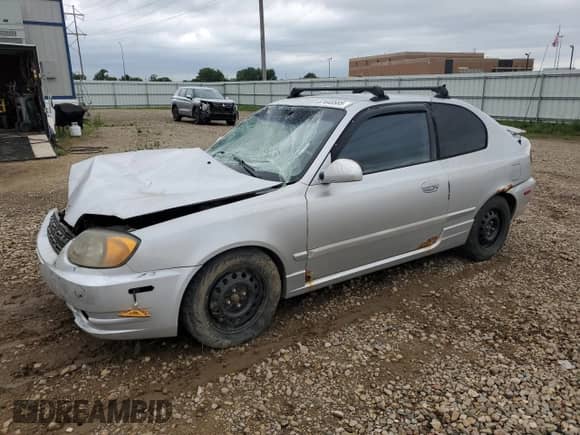 2004 Hyundai Accent GL с VIN KMHCG35C84U284632, выставлен на аукционе Copart как лот 67440585 с пробегом Не указан миль и Чистый • Clean title. История ставок и продаж доступна на DreamBid. Изображение 1.