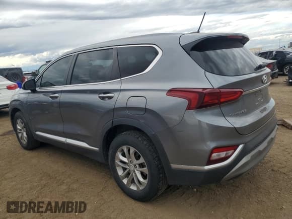 ✅ 2019 Hyundai Santa Fe SE • VIN: 5NMS2CAD8KH089843 • Лот: 80187565. Опубликован ранее на Copart с пробегом 121 064 миль. Бесплатный доступ к архиву аукционных продаж из США и подробный отчёт об истории автомобиля на DreamBid. Изображение 2.