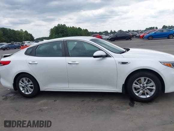 ✅ 2016 Kia Optima LX • VIN: KNAGT4L31G5099425 • Lot: 43233093. Listed on IAAI with 124,525 mi. Free auction sales archive from the USA and detailed vehicle history report at DreamBid. Image 14.