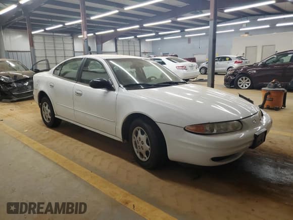 ✅ 2002 Oldsmobile Alero GX • VIN: 1G3NK52F92C182703 • Лот: 62103345. Опубликован ранее на Copart с пробегом 83 974 миль. Бесплатный доступ к архиву аукционных продаж из США и подробный отчёт об истории автомобиля на DreamBid. Изображение 4.