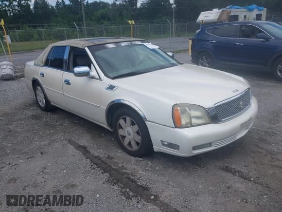 ✅ 2003 Cadillac DeVille DTS • VIN: 1G6KF57973U124663 • Лот: 43042100. Опубликован ранее на IAAI с пробегом 192 073 миль. Бесплатный доступ к архиву аукционных продаж из США и подробный отчёт об истории автомобиля на DreamBid. Изображение 1.