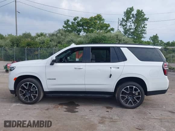 2023 Chevrolet Tahoe RST z VIN 1GNSKRKD7PR506168, wystawiony jako IAAI lot #42833878 z przebiegiem Nie podano mil oraz . Historia ofert i sprzedaży dostępna na DreamBid. Obrazek 13.