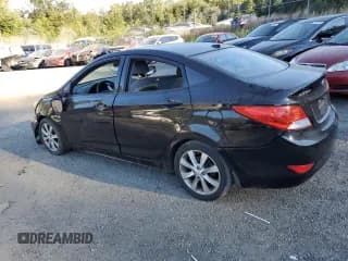 ✅ 2014 Hyundai Accent GLS • VIN: KMHCU4AE2EU592516 • Лот: 73720284. Опубликован ранее на Copart с пробегом 141 296 миль. Бесплатный доступ к архиву аукционных продаж из США и подробный отчёт об истории автомобиля на DreamBid. Изображение 2.