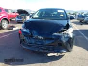 ✅ 2021 Toyota Prius L Eco • VIN: JTDKAMFU5M3146454 • Lot: 43462876. Wystawiony na IAAI z przebiegiem 93 810 mil. Bezpłatny archiwum sprzedaży aukcyjnych z USA i szczegółowy raport historii pojazdu na DreamBid. Zdjęcie 6.