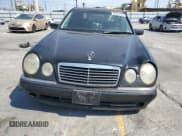 ✅ 1999 Mercedes-Benz E 320 • VIN: WDBJF65H7XA900885 • Lot: 65560535. Listed on Copart with 294,808 mi. Free auction sales archive from the USA and detailed vehicle history report at DreamBid. Image 5.