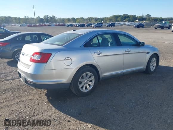 ✅ 2010 Ford Taurus SE • VIN: 1FAHP2DW8AG150297 • Лот: 43365638. Опубликован ранее на IAAI с пробегом 200 409 миль. Бесплатный доступ к архиву аукционных продаж из США и подробный отчёт об истории автомобиля на DreamBid. Изображение 4.